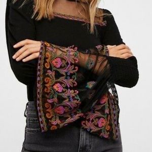 Free People bell sleeve embroidered top.